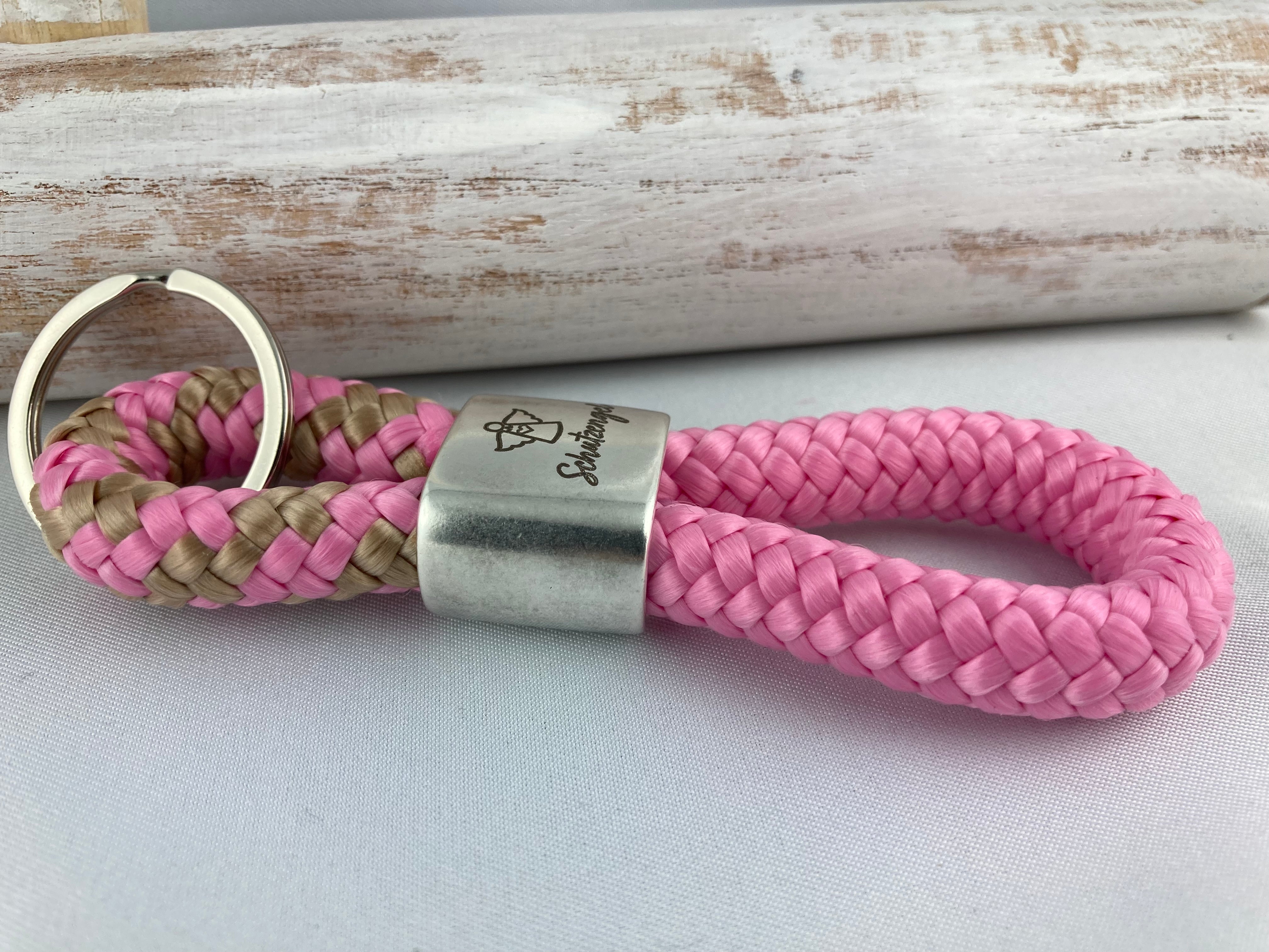 Schlüsselanhänger aus Segelseil mit versilbertem Zwischenstück mit Gravur "Schutzengel", rosa-beige/ rosa