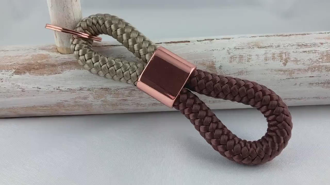 Schlüsselanhänger aus Segelseil mit Zwischenstück roségoldfarben, taupe/ braun