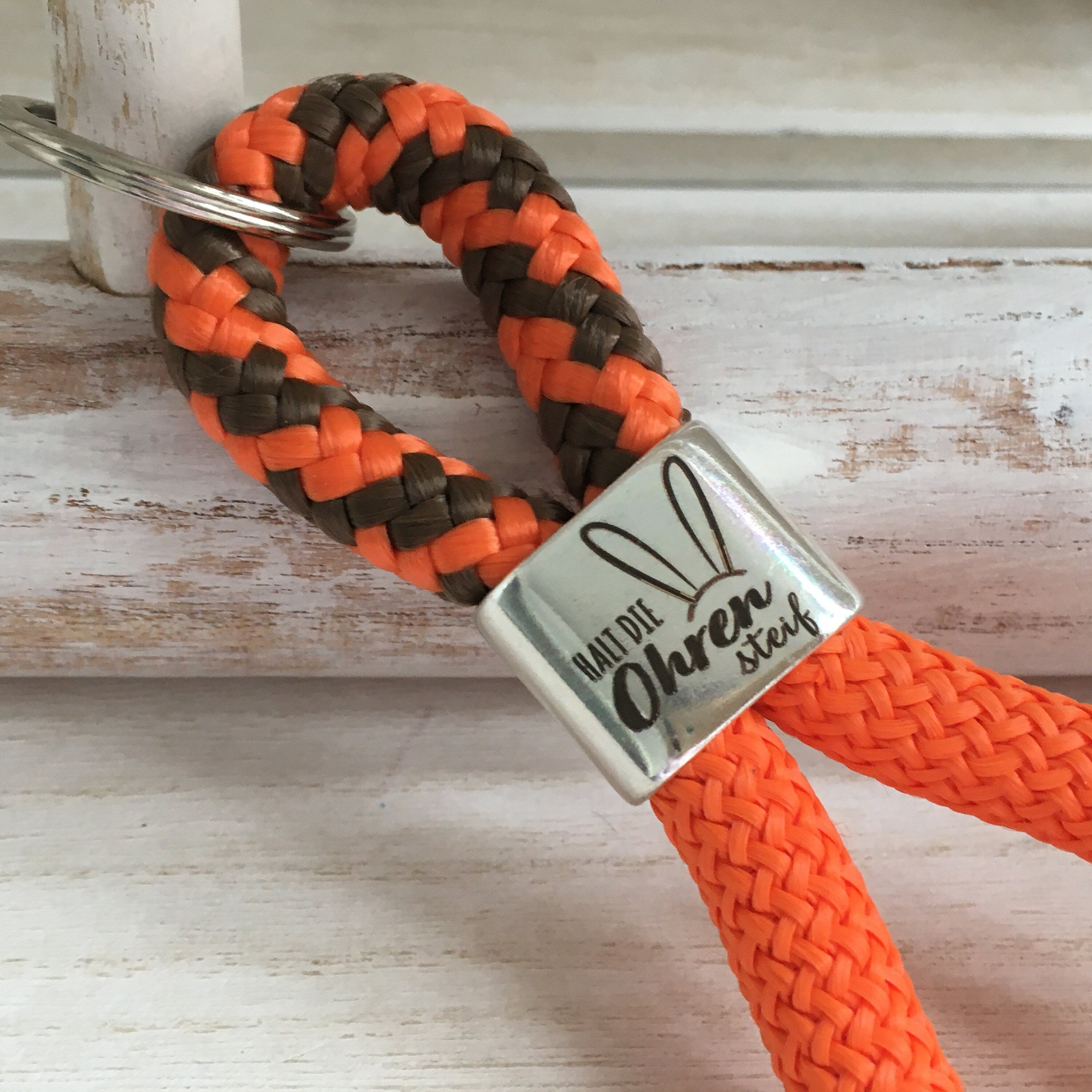 Schlüsselanhänger aus Segelseil "Halt die Ohren steif", maritimer Schlüsselanhänger, orange-braun/orange