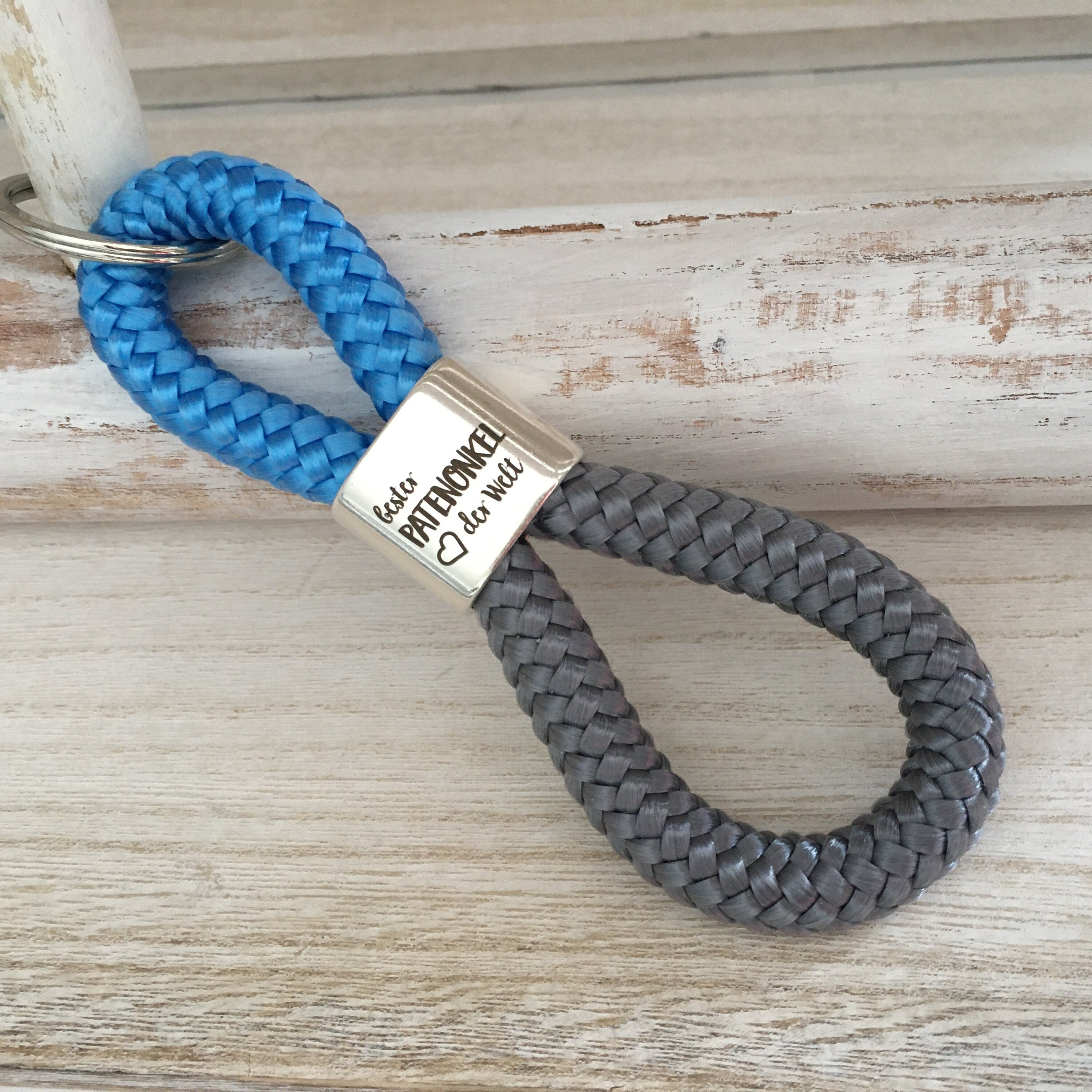 Schlüsselanhänger aus Segelseil mit versilbertem Zwischenstück mit Gravur "Bester Patenonkel der Welt" himmelblau/ grau