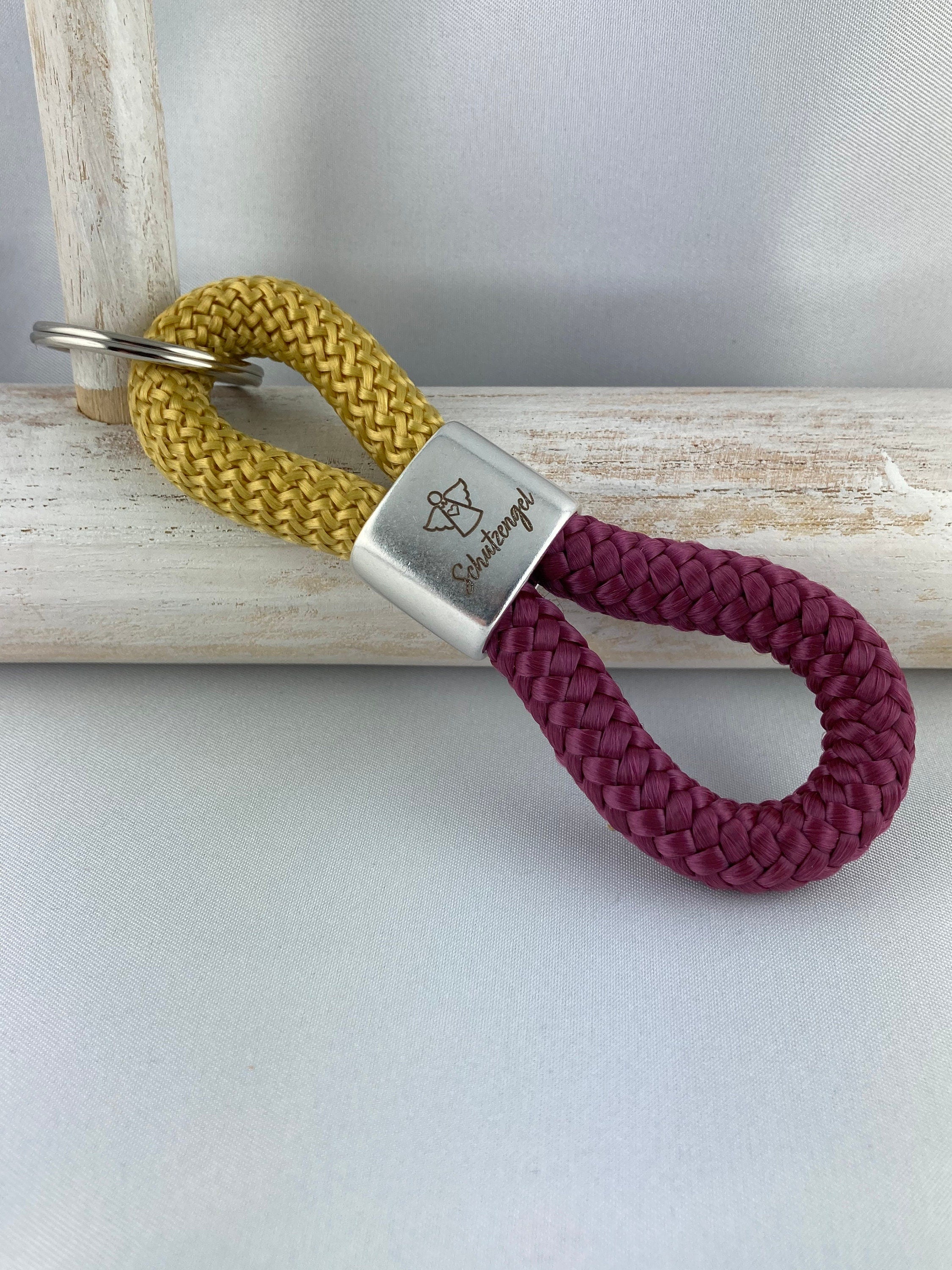 Schlüsselanhänger aus Segelseil mit versilbertem Zwischenstück mit Gravur "Schutzengel", curry/ aubergine