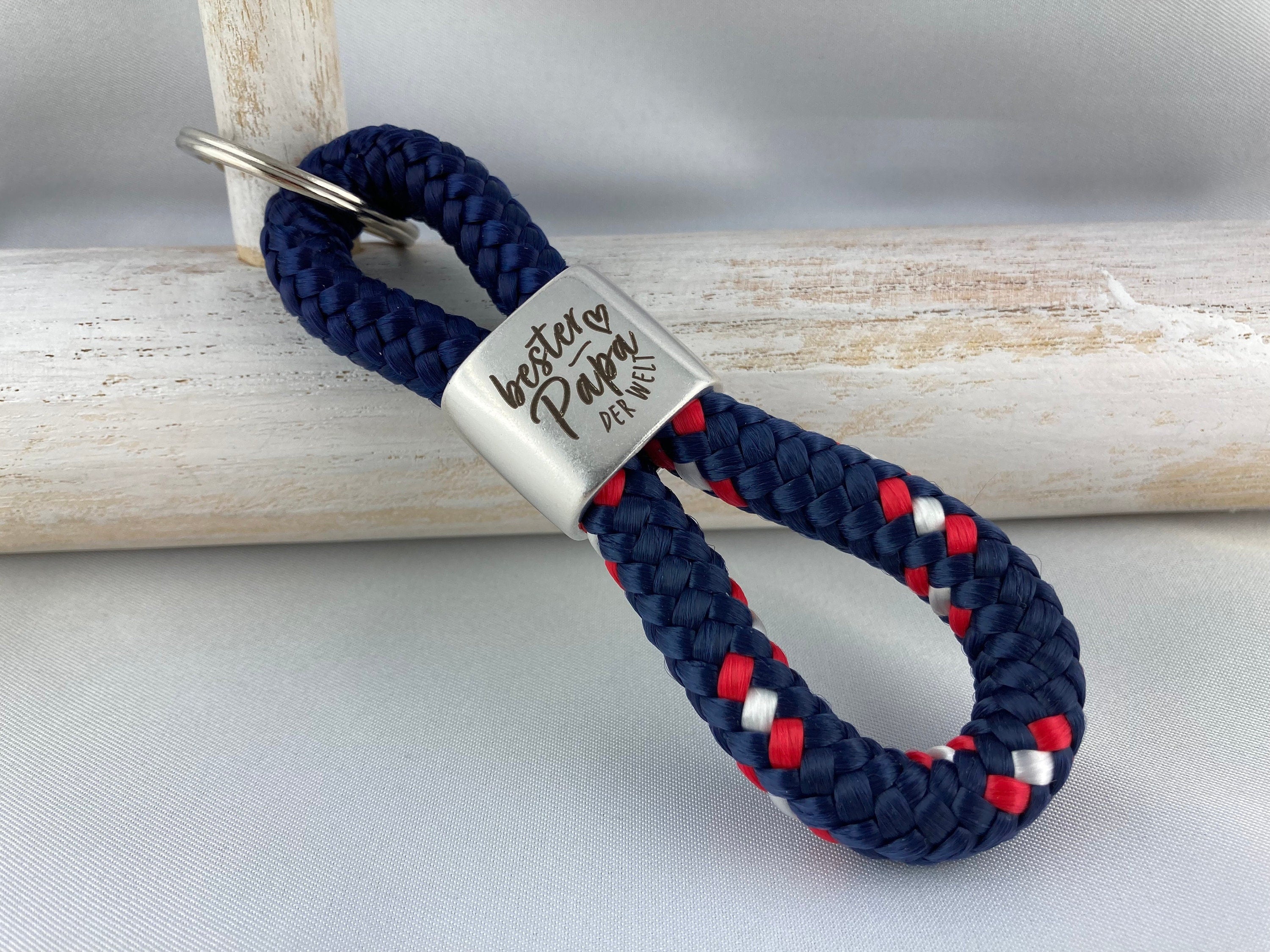 Schlüsselanhänger aus Segelseil mit versilbertem Zwischenstück mit Gravur "Bester Papa der Welt", dunkelblau/ dunkelblau-rot-weiß
