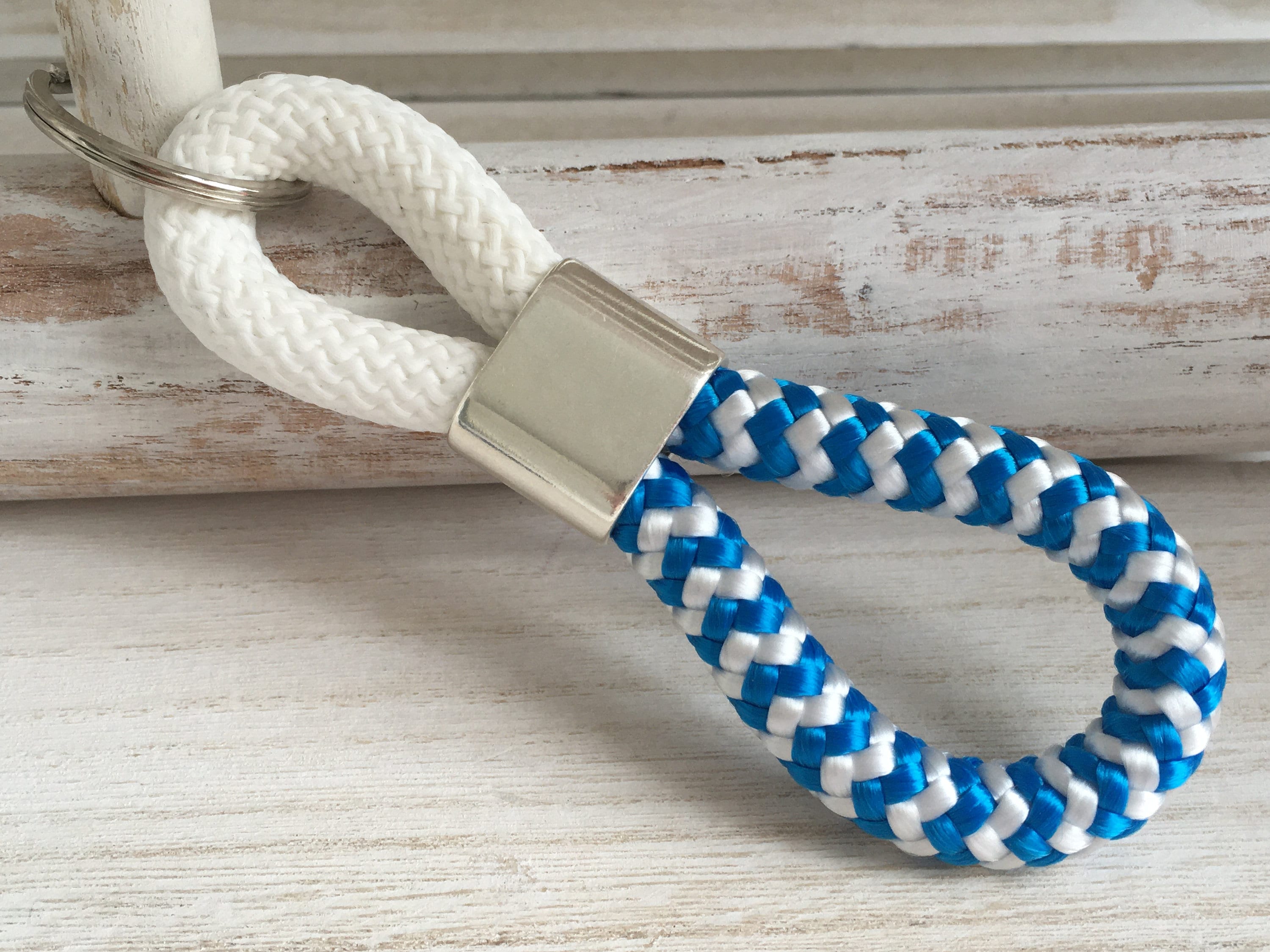 Schlüsselanhänger aus Segelseil mit versilbertem Zwischenstück mit Gravur "Zuhause ist, wo du bist" in Wunschfarbe ganz individuell